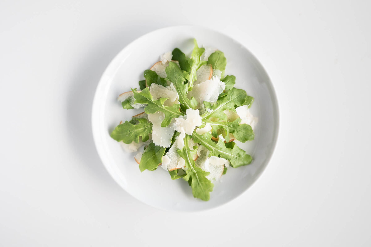 Drei Zutaten, ein Salat: Birne, Rucola und Parmigiano Reggiano