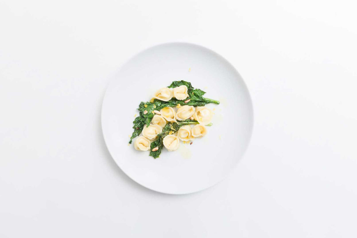 Rezept: Tortellini di Parmigiano con Cima di Rapa